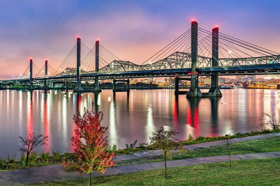 Contact - View of Bridge across the Ohio River between Louisville, Kentucky and Jeffersonville, Indiana at Dusk